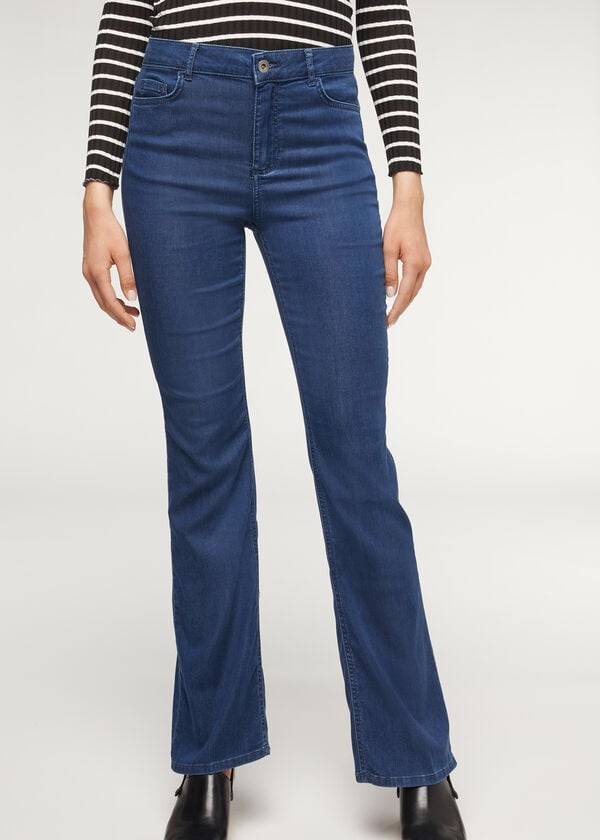 marinblå calzedonia eco light flared denim jeans för dam