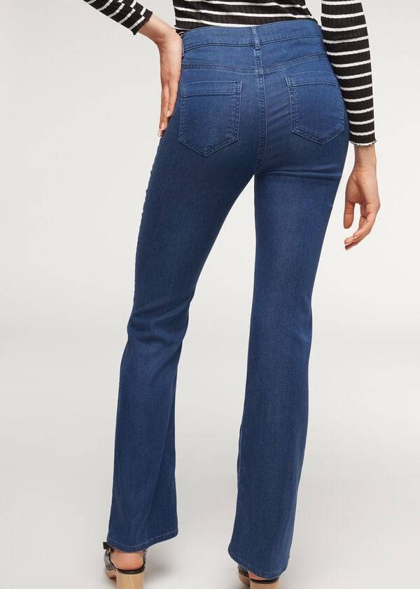 marinblå calzedonia eco light flared denim jeans för dam
