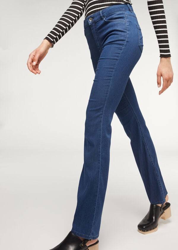 marinblå calzedonia eco light flared denim jeans för dam